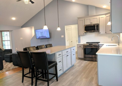 Renovated Kitchen: Island with Pendant Fixtures