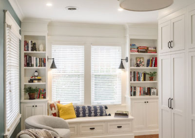 built-in bookshelves and a long storage bench seat