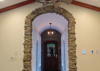 stone work surrounding arched doorway