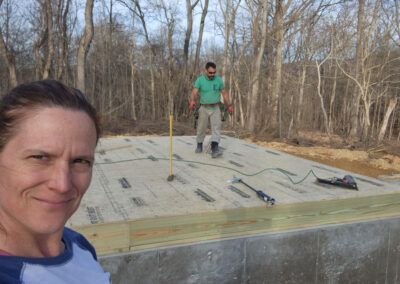 February 8th - Paul and Melani getting plywood on the 1st floor deck