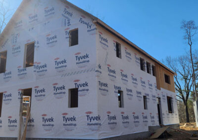 March 15 - house wrapped in Tyvek