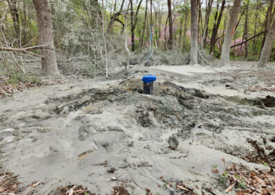 April 14th - the well casing and the what's left behind after digging through hundreds of feet of earth (850 ft depth)