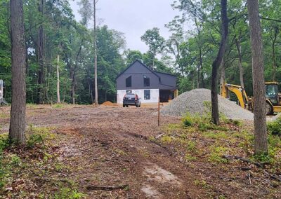 June 23 - backhoe and stone for septic field
