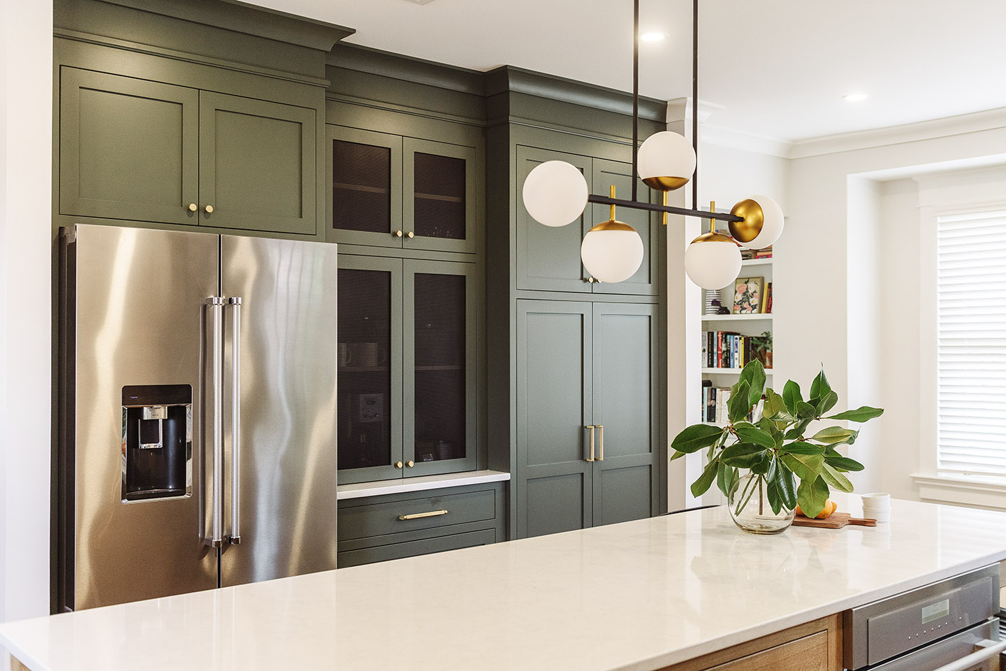 Custom wood kitchen cabinetry in Vogue Green