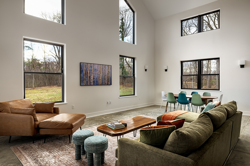 Industrial cabin living room space at the C&O Abode, built by Harmon Builders