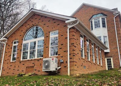 Finished addition matching Colonial-style home