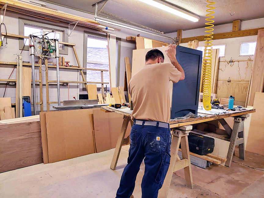 Paul Harmon in his workshop in Keedysville, working on custom cabinetry for a Legacy Home