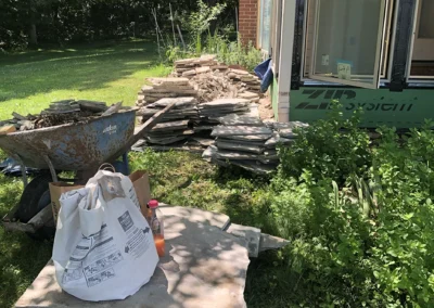 Flagstone removal from sunroom.