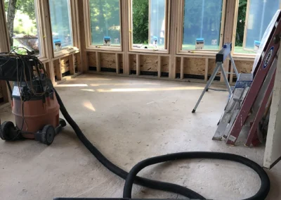 Clean-up after flagstone was removed from floor.