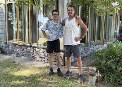 Paul and son Jesse Harmon work together as they conclude the finishing work on the cedar.