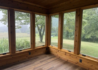 Looking East, out the sunroom into the pastures and valley.
